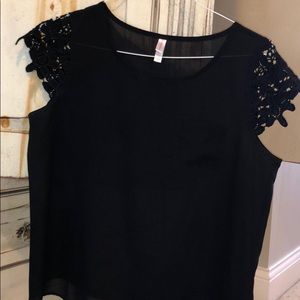 black blouse with lace cap sleeves